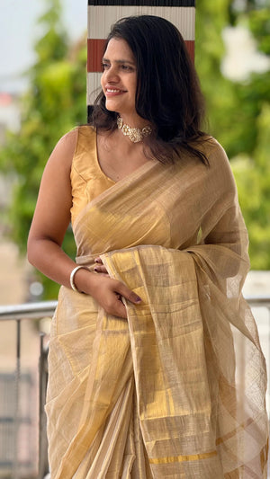 HOP147 — Raga Tissue Golden Zari Tassel Pallu Saree